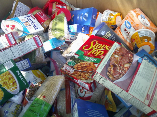 Various dry goods in a cardboard container.